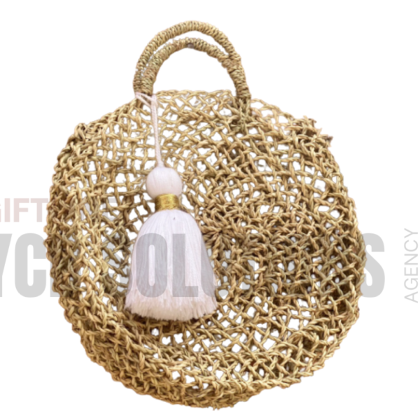 Sac rond artisanal en paille tressée avec pompon